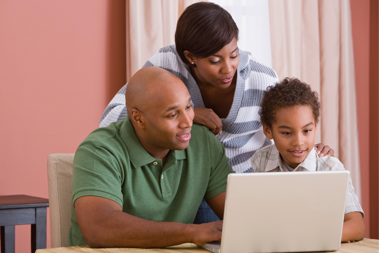 A family online banking on their laptop.
